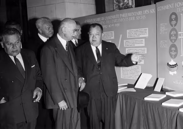 Robert Schuman visits an exhibition marking the 6th anniversary of the Six's ECSC Parliamentary Assembly in September 1958