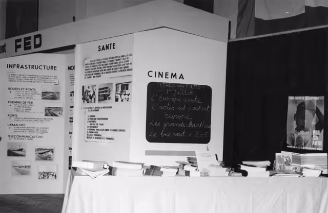 Fotagrafa 6: EEC-AASM (CEE-EAMA in French) exhibition stand at the Town Hall in Brussels, Belgium, January 11, 1969.