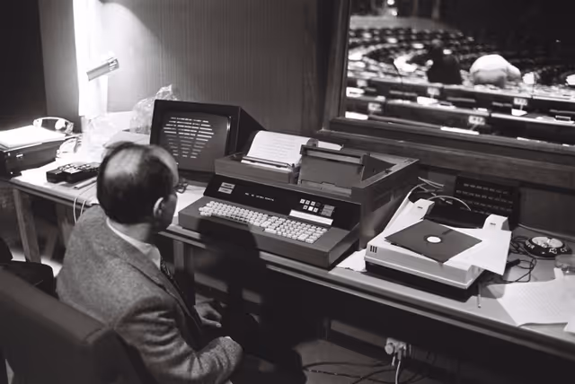 Photo 3: A technician at work during a voting session in the hemicycle in October 1979.Electronic vote
