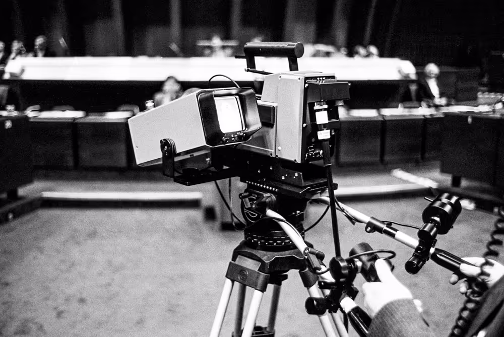 A cameraman films during a plenary session at the European Parliament
