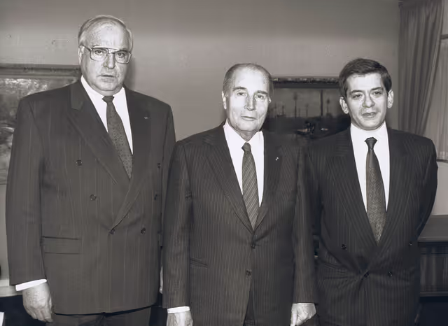 French President and German Chancellor address a solemn plenary session in Strasbourg in November 1989 following the fall of the Berlin's Wall