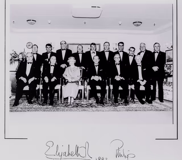 Reproduction of a family picture of European heads of State, signed by Queen Elisabeth.