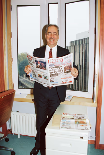 Fotografie 4: MEP Lyndon HARRISON in his office with an issue of Widnes World newspaper