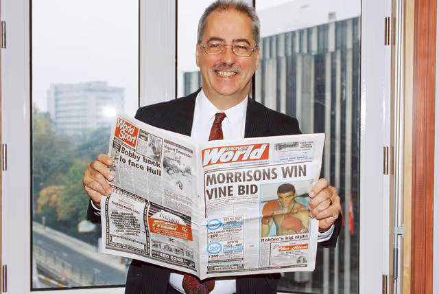 Fotografie 3: MEP Lyndon HARRISON in his office with an issue of Widnes World newspaper