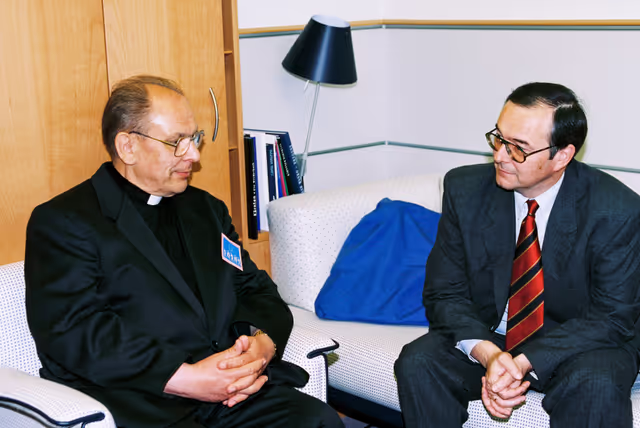 Photo 2: MEP Herbert BOSCH meets with a priester in his office in Brussels