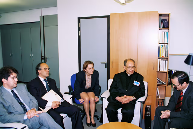 Photo 3: MEP Herbert BOSCH meets with a priester in his office in Brussels