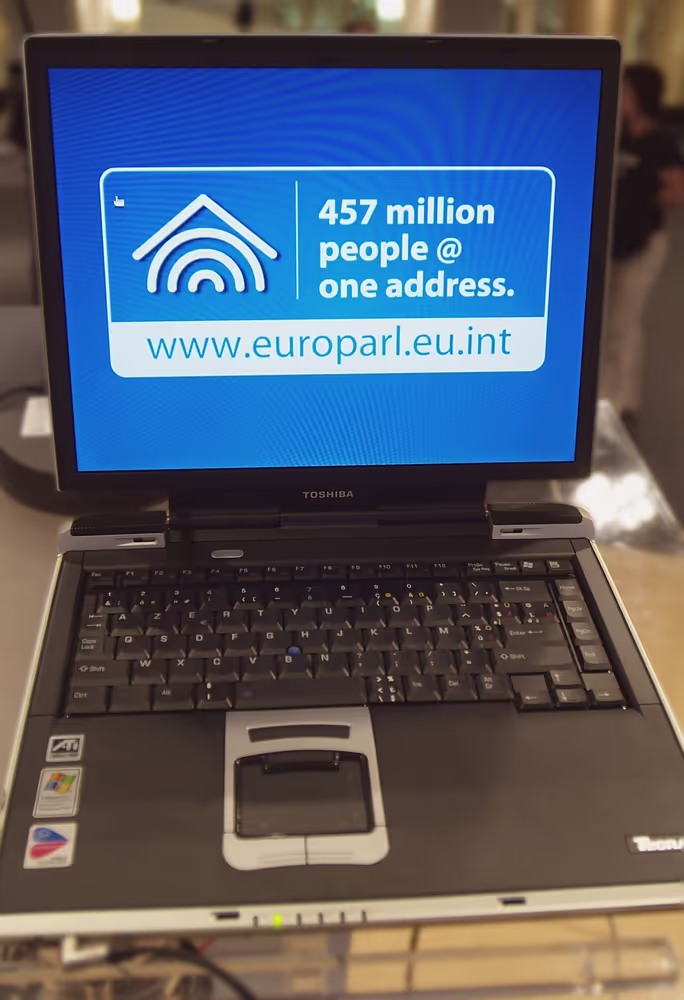 Laptop computer with the 457 million people@ one address quote