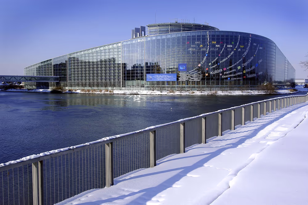 Outside view on the European Parliament building Louise Weiss in Strasbourg with snow - LOW