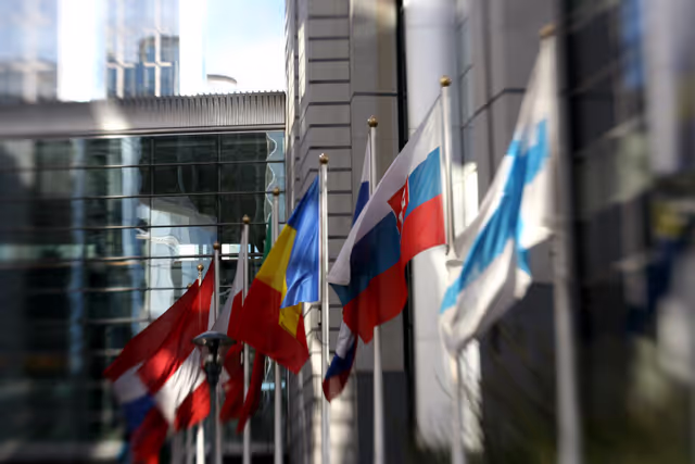 Photo 8: Flags of the EU member states in front of the EP in Brussels.