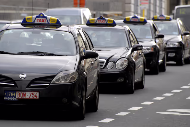 Снимка 24: taxi cabs in the streets of Brussels