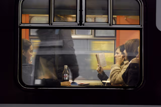 Снимка 16: Commuters in a train