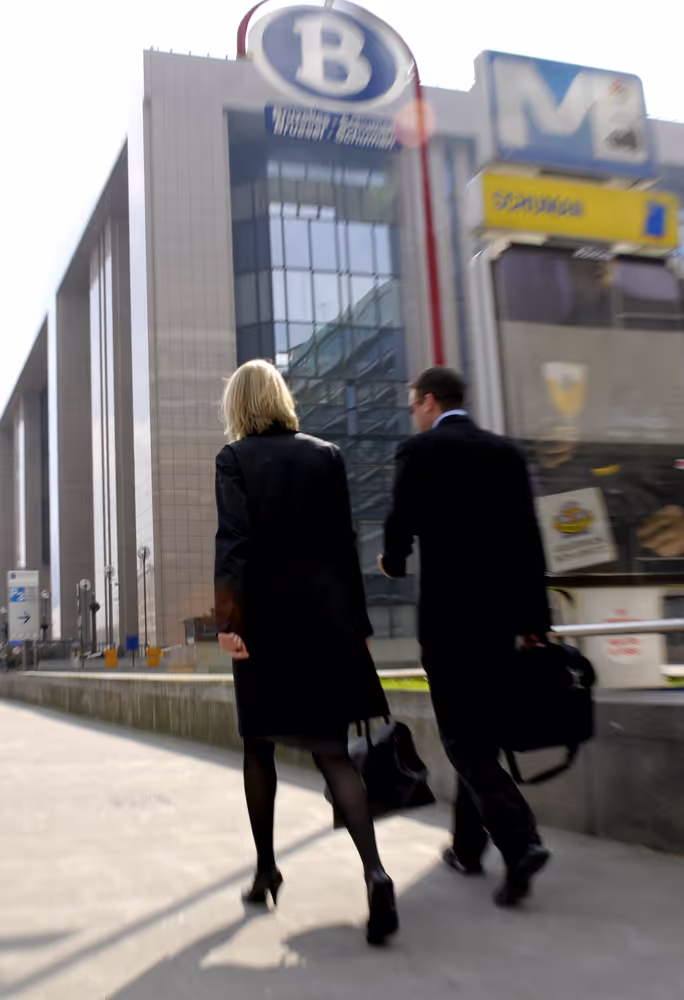 Commuters going to work, leaving the Schuman railway / subway  station