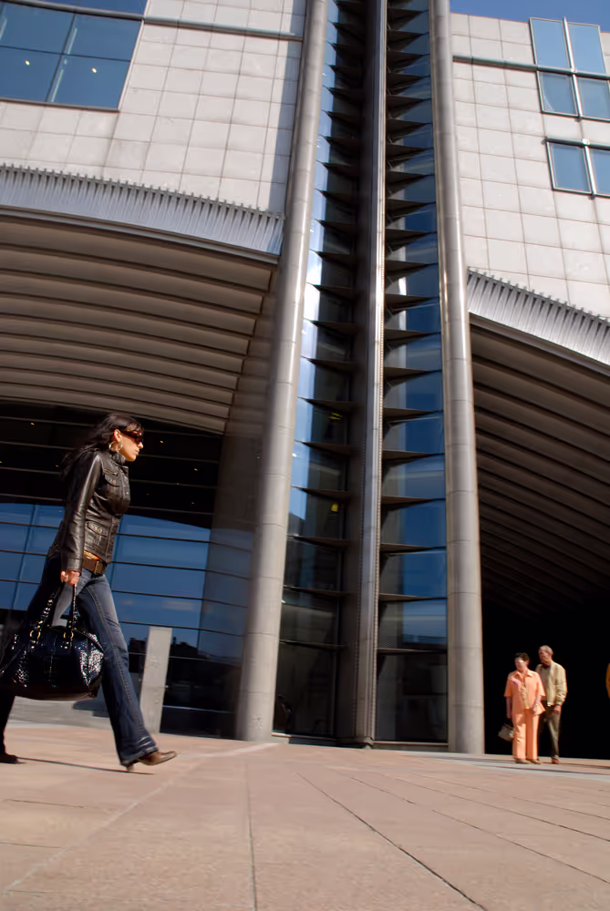 People walking in front of the EP building in Brussels.