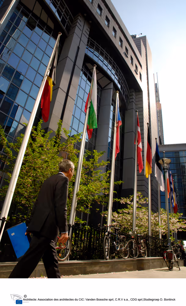 People walking in front of the EP building in Brussels.