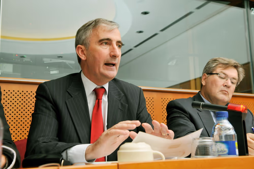 Gay MITCHELL in a meeting at the EP in Brussels.