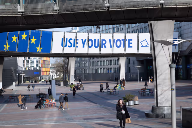 Photo 19: 2024 European elections campaign banner on the Agora Simone Veil of the European Parliament in Brussels