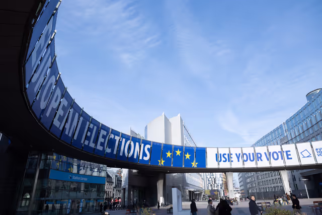 Photo 18: 2024 European elections campaign banner on the Agora Simone Veil of the European Parliament in Brussels