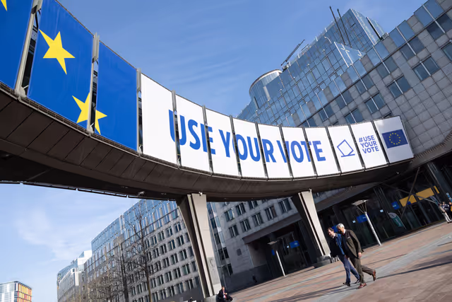 Photo 17: 2024 European elections campaign banner on the Agora Simone Veil of the European Parliament in Brussels