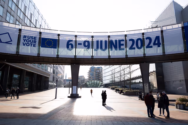 Photo 15: 2024 European elections campaign banner on the Agora Simone Veil of the European Parliament in Brussels