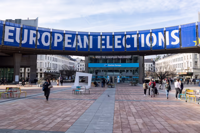 Photo 12: 2024 European elections campaign banner on the Agora Simone Veil of the European Parliament in Brussels