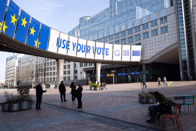 Photo 3: 2024 European elections campaign banner on the Agora Simone Veil of the European Parliament in Brussels