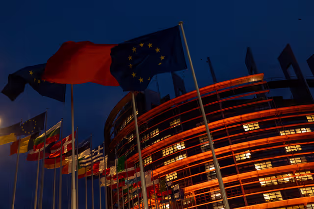 International Day for the Elimination of Violence against Women - ' Orange the world ', UN campaign to end violence against women and girls. European Parliament building in Strasbourg lights up in orange