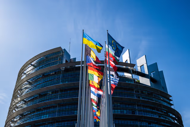 Flags are raised at the EP headquarters in Strasbourg.