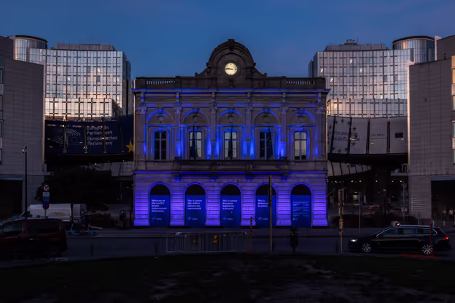 International Missing Children's Day 2026 - Station Europe building illuminated in blue