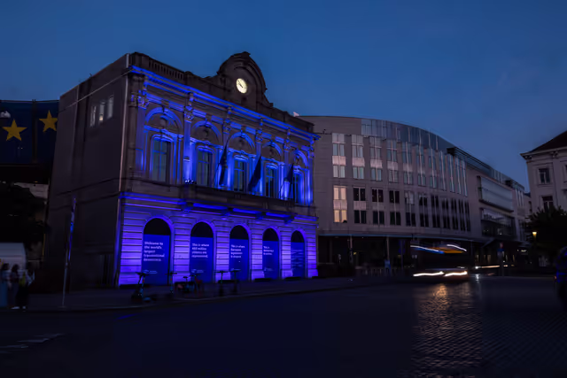 International Missing Children's Day 2026 - Station Europe building illuminated in blue