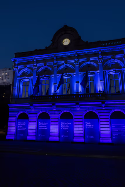 International Missing Children's Day 2026 - Station Europe building illuminated in blue