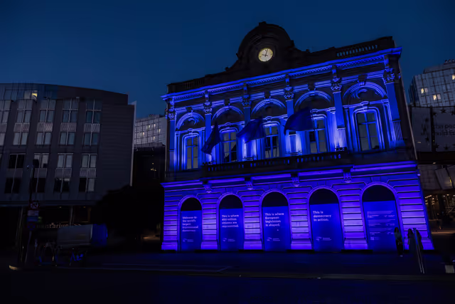 International Missing Children's Day 2026 - Station Europe building illuminated in blue