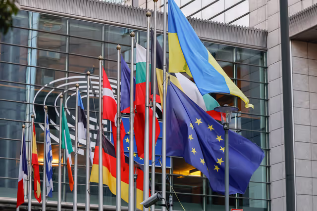 German and European flags at half mast in front of the EP buildings in Brussels, as sign of solidarity with the victims of the Berlin Pride attack